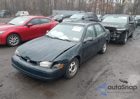 1999 Toyota Corolla Ve z USA, uszkodzony, nr VIN 2T1BR12E3XC128052